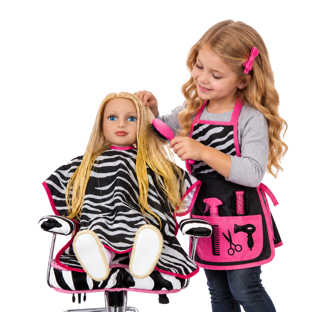 A child styling a My Salon Doll’s real hair in a salon chair
